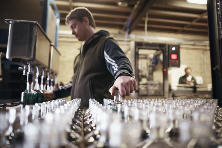 Workers at a distillery